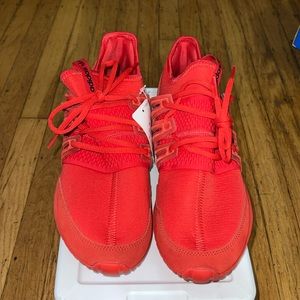 Adidas tubular radial red running shoes